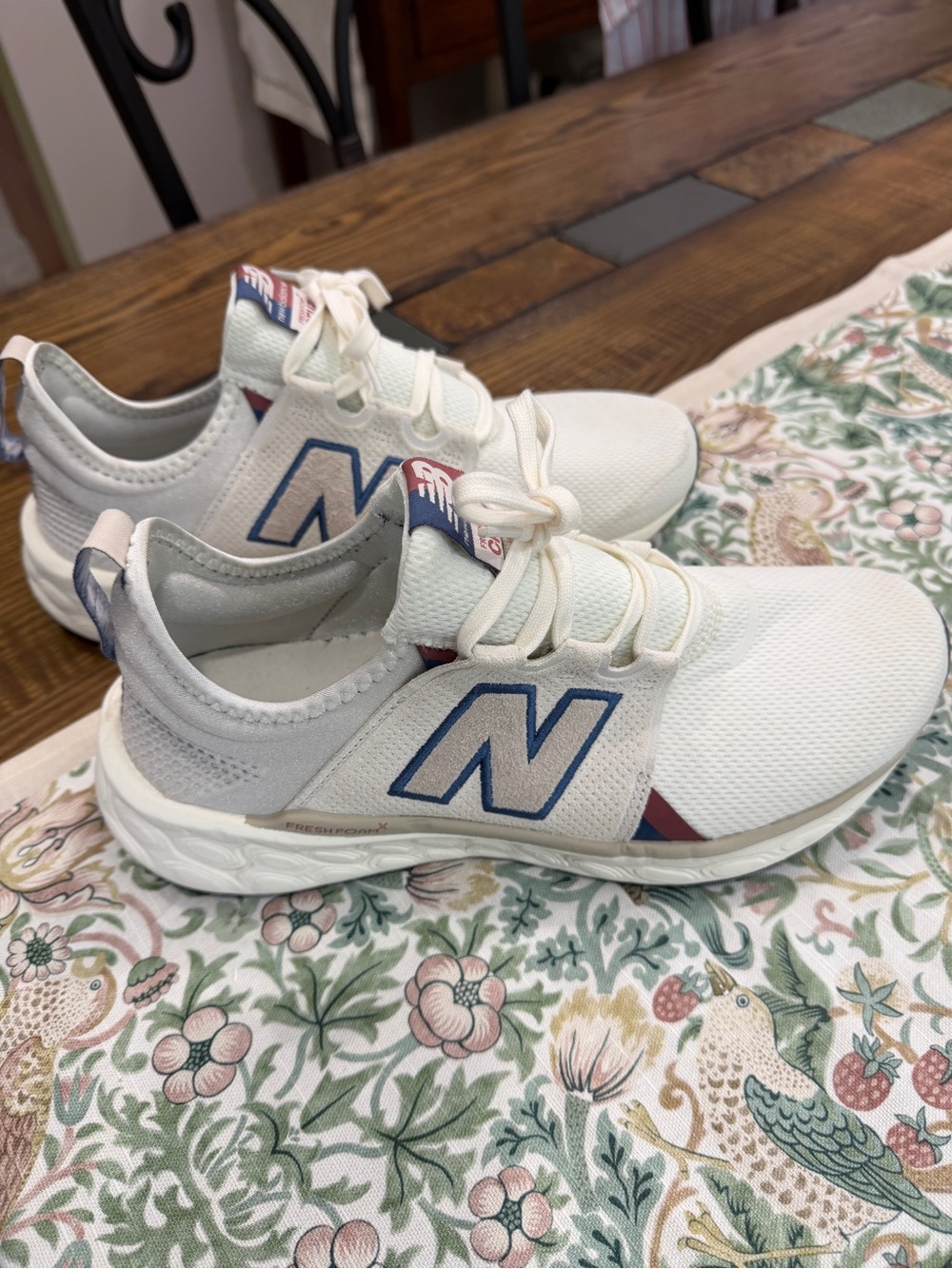 New Balance men’s cream and Blue Athletic Sneakers